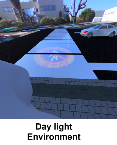 Simulated pedestrian caution projection on a crosswalk in daylight